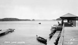 A black & white photograph of the dock at Lake Joseph, 1934.
