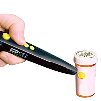 Person using a PenFriend labelling device to read a medication bottle