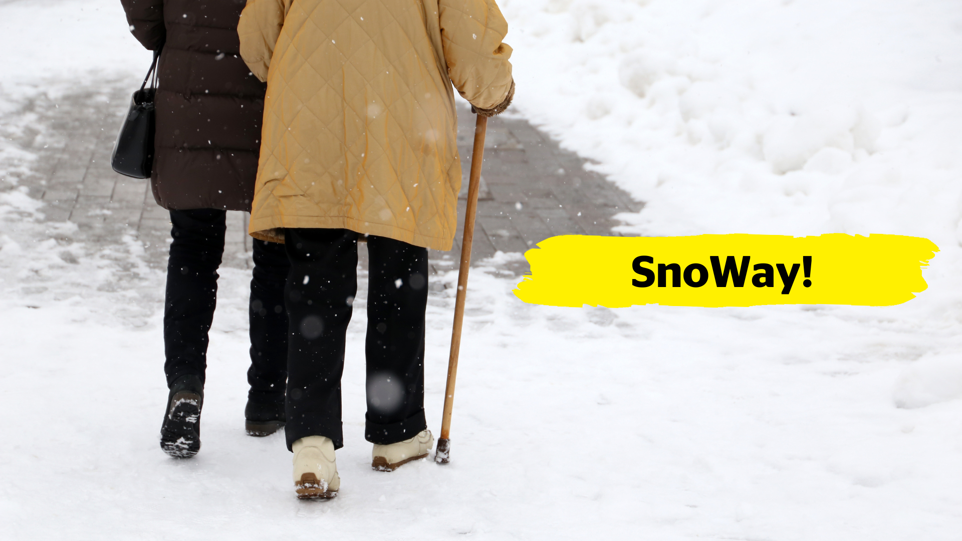 Two people from behind walk down a snowy pathway. One elderly person uses a walking cane and holds onto the elbow of their companion.  In the centre of the image, there is a yellow banner overlay with the text “SnoWay!”
