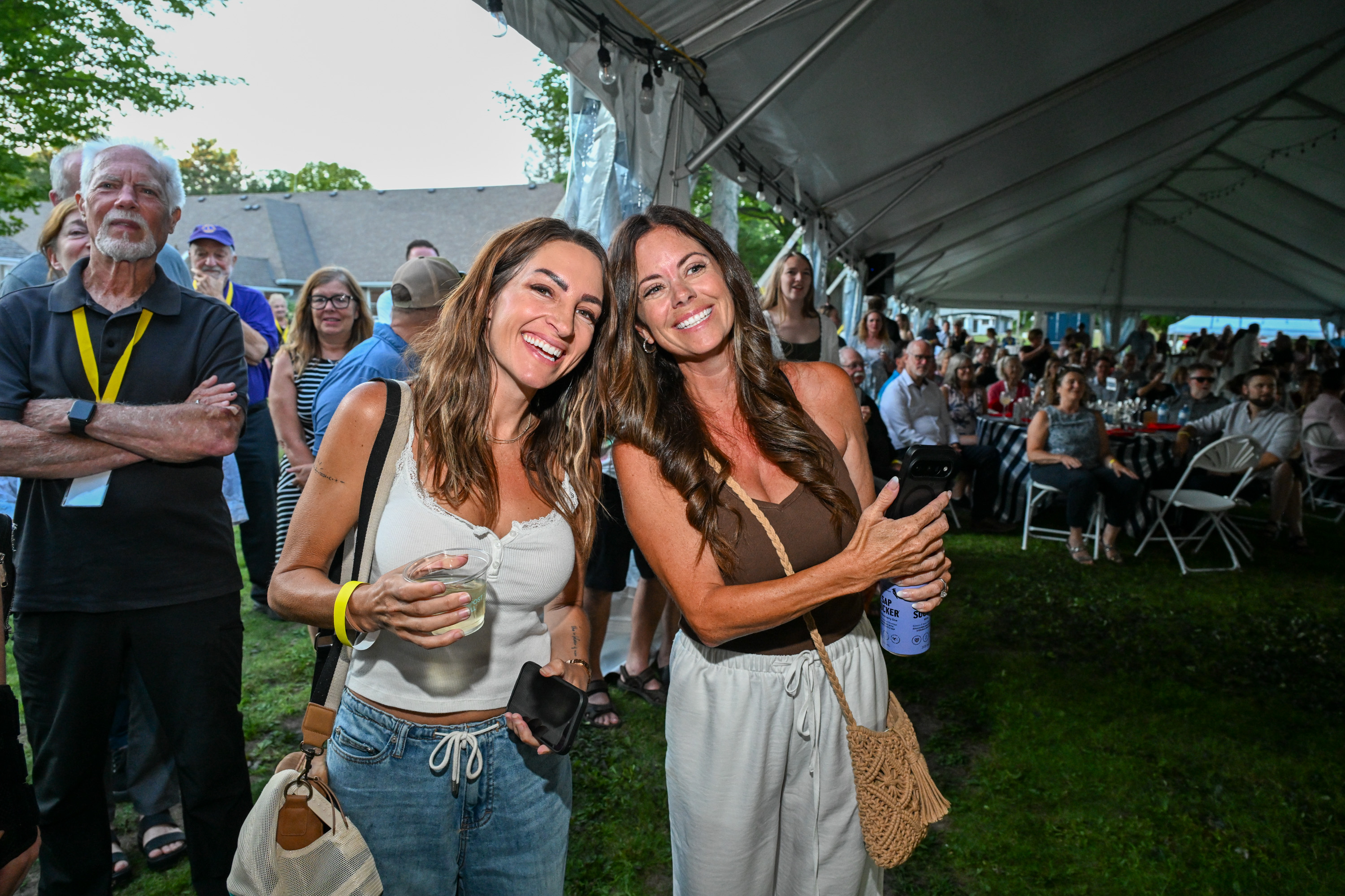 Two women smiling at Lake Joe Live