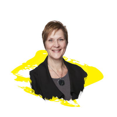A professional headshot of Monique Pilkington. A yellow illustration of a brush stroke underlines the photograph.