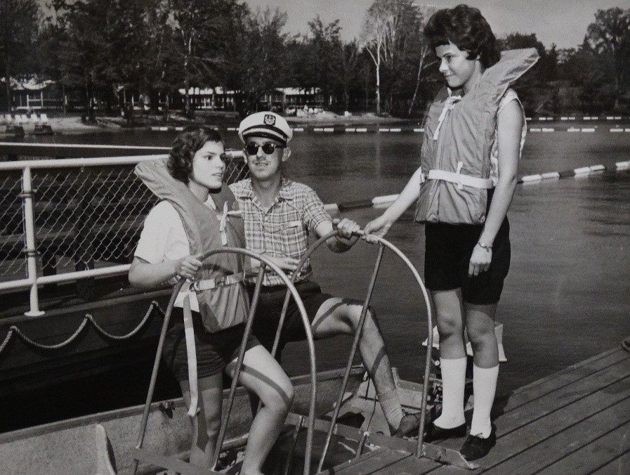 Summer 1963. A blind guest steps off the boat onto the CNIB Lake Joe dock, then known as the CNIB Lake Joseph Adjustment-Training and Holiday Centre.