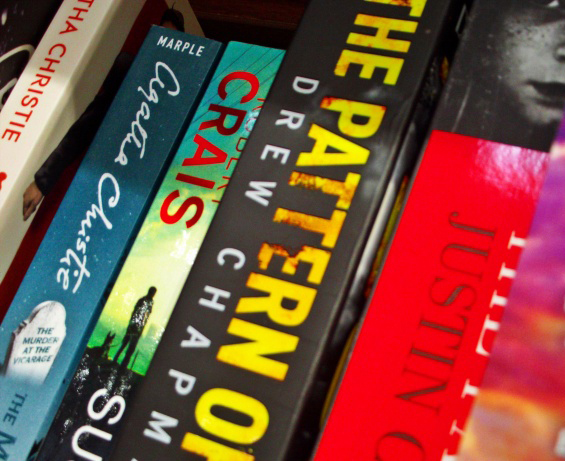 Close-up of books stacked together