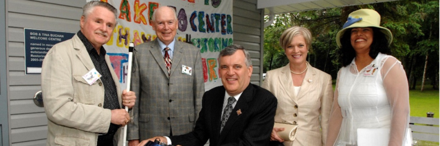 The Honourable David Onley joins former CNIB president Jim Sanders, former CNIB Board Chair Al Jaimeson, and other CNIB Staff for an event at our Lake Joe Camp in Muskoka, Ontario.