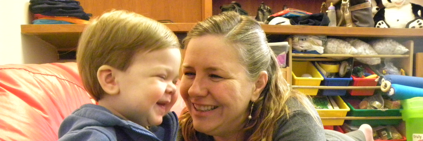 Buy and mother smiling 