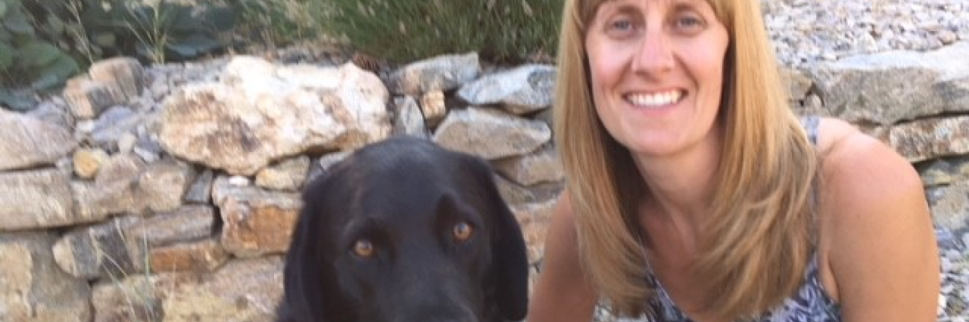 Guide dog Yanni in harness beside handler Bobby Weir