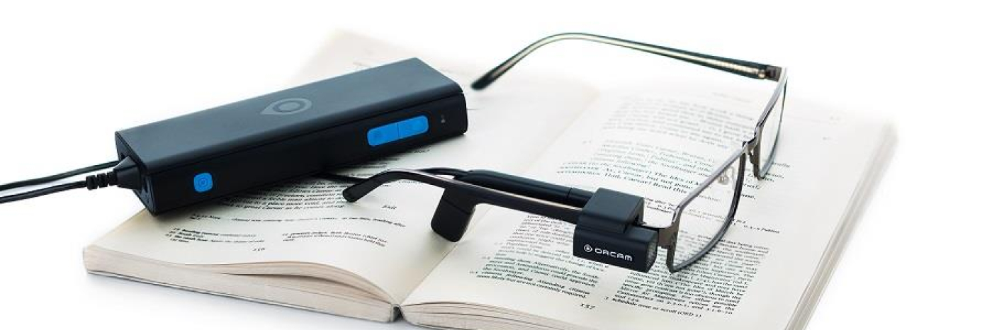 Orcam mounted on top of a pair of glasses