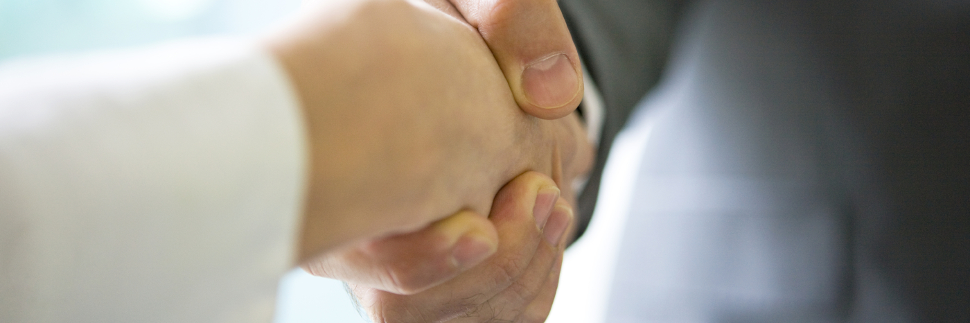 two people shaking hands