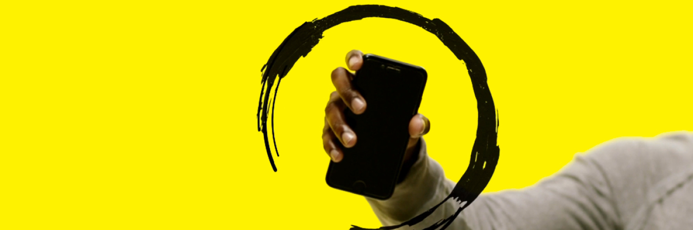 A smartphone surrounded by a black swirl.