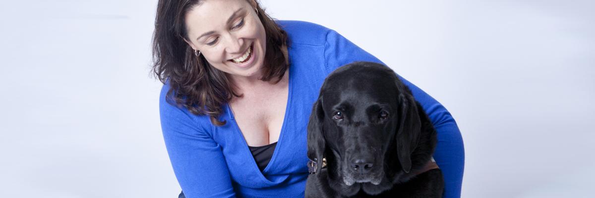 Victoria and her guide dog Alan.