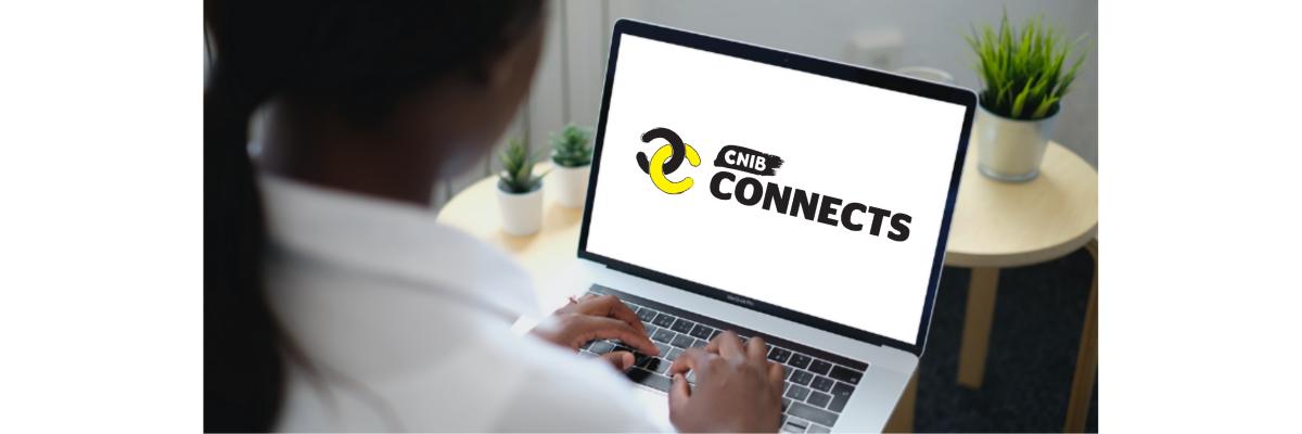 An over the shoulder photograph of a woman browsing on her laptop computer. On the computer screen, the CNIB Connects logo is displayed.