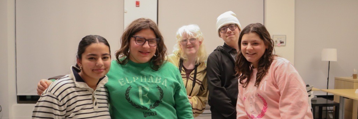 The Ottawa Youth Leadership Crew smiling at the camera.