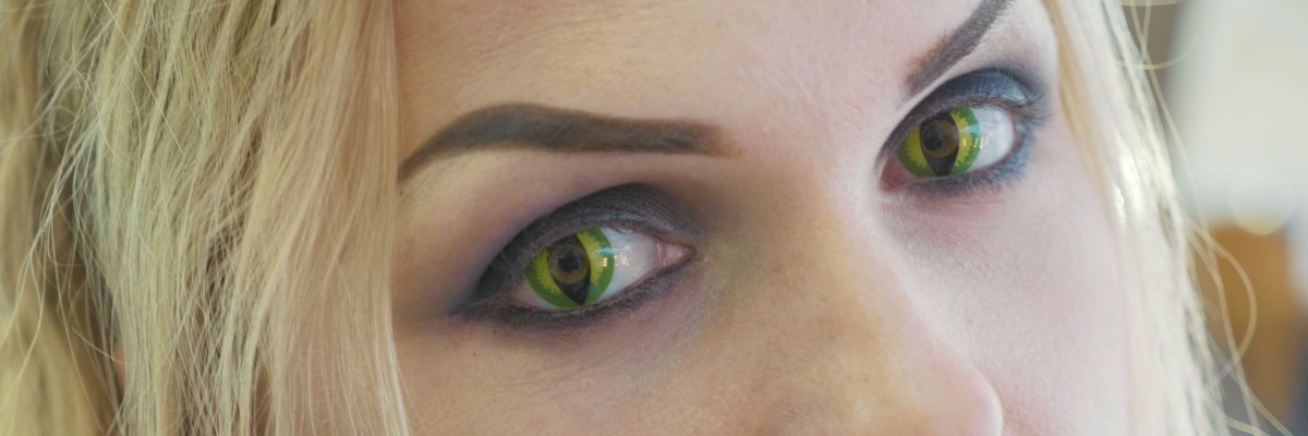 Image of woman wearing cat eye contact lenses