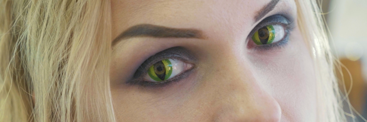 Image of woman wearing cat eye contact lenses