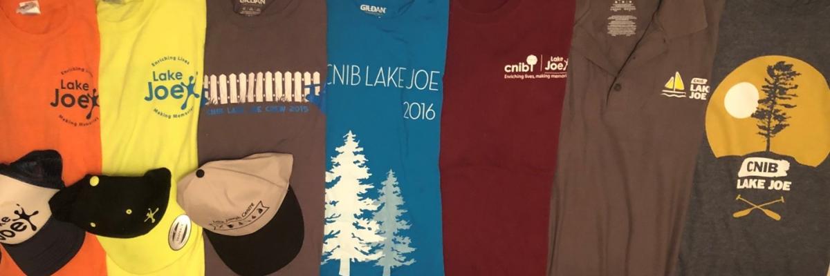 Seven Colourful CNIB Lake Joe staff t-shirts from over the years.