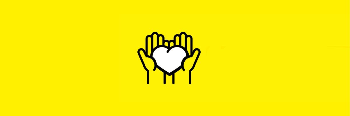 A yellow graphic of hands holding a white heart outlined in black.