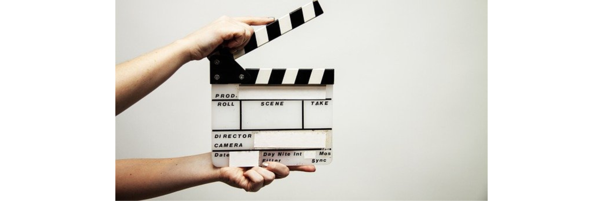 A black and white movie clapperboard. 