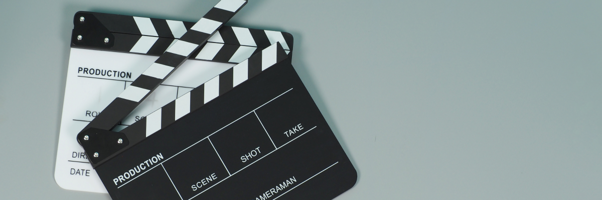 A black and white movie clapperboard. 