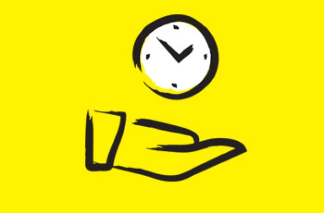 hand holding a clock