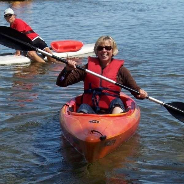 Joanne sitting in a kayak at CNIB Lake Joe.