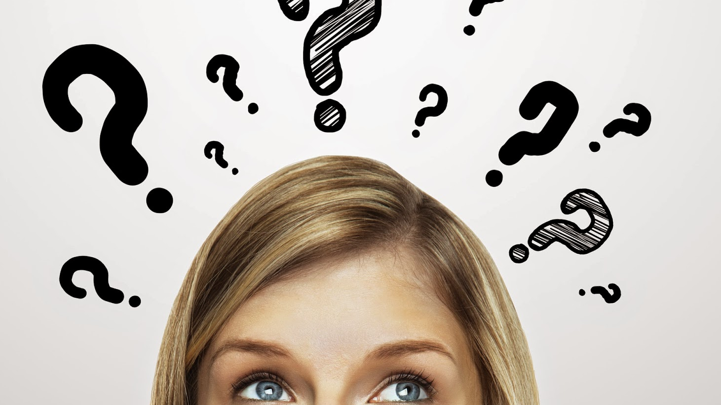 Photo of the top part of a woman's face with an illustration of question marks floating above her head.