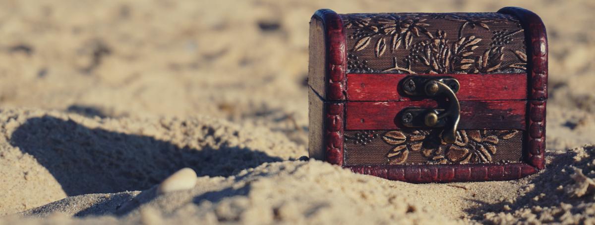 A treasure chest sits on a beach