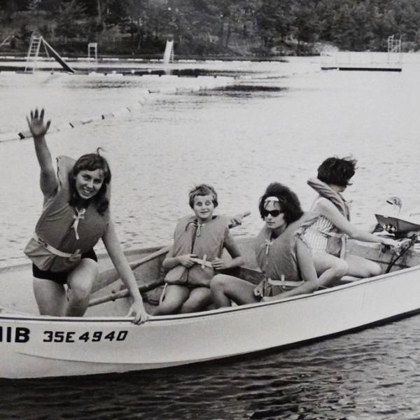 4 girls in small boat