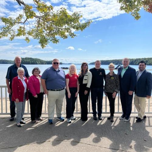 Mayor Dale Robinson, Mayor Ann MacDiarmid, Sharon Cadeau, Interim Chair of the Métis Nation of Ontario, MPP Graydon Smith, Jade Ondrik, goalball athlete, Angela Bonfanti, CNIB President & CEO, Aaron Prevost, goalball athlete, Monique Pilkington, Executive Director, CNIB Lake Joe, Hon. Neil Lumsden, Minister of Sport, Eugene Chong, General Manager, CNIB Lake Joe.