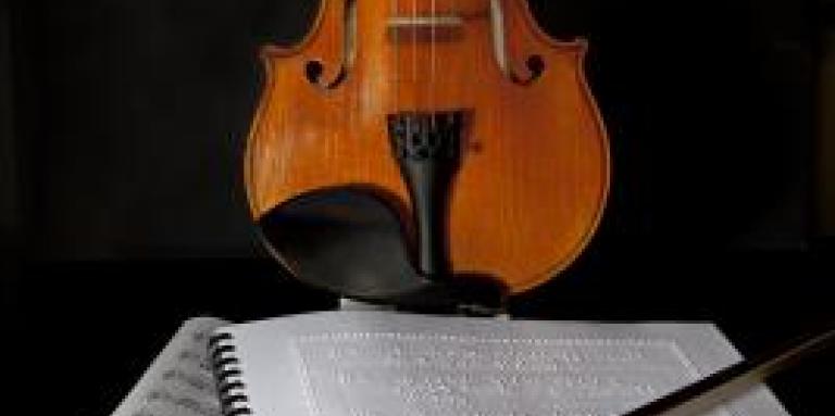 Braille music and a violin 