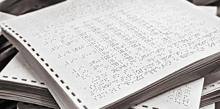 A stack of braille materials