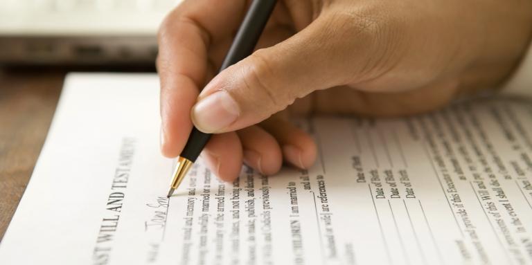 hand signing a will