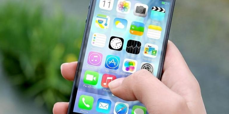 An image of an iPhone with apps