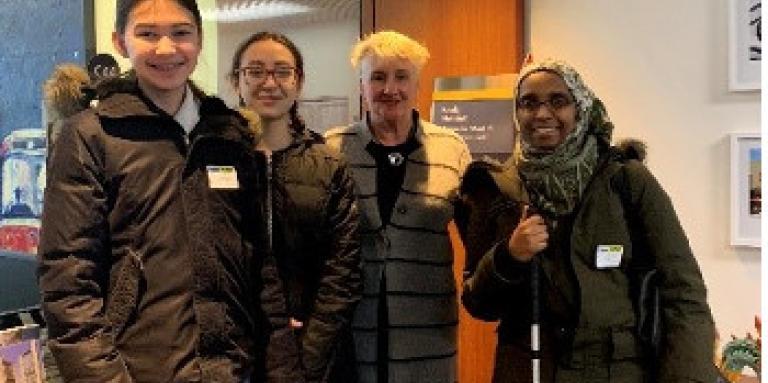 Ward 14 Toronto-Danforth Councillor Paula Fletcher with students Dalia Golovco and Maddie Dick, and Ramla Abukar, Coordinator, Advocacy and Engagement, CNIB posing for a photo.