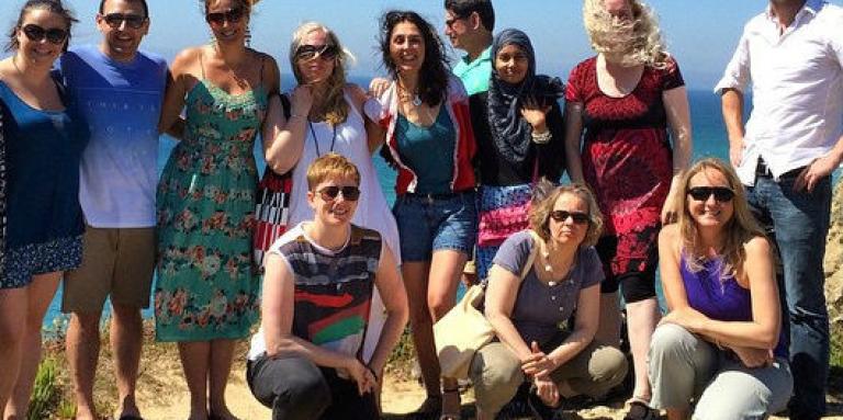 Group of travellers smiling 