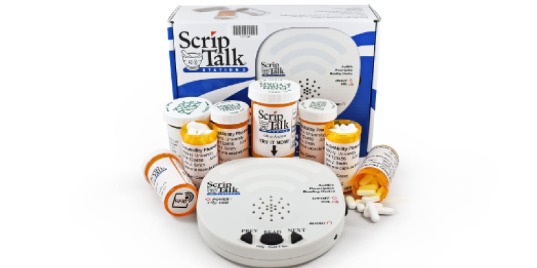 A ScripTalk Station Reader surrounded by pill bottles.