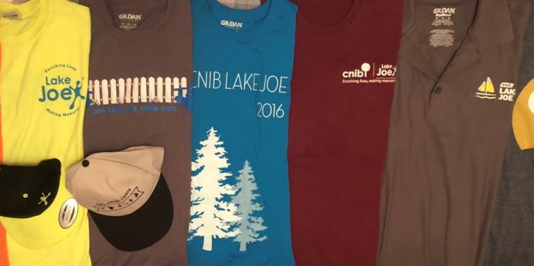 Seven Colourful CNIB Lake Joe staff t-shirts from over the years.